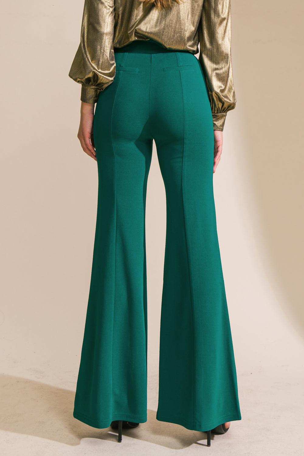 Flying Tomato Hey Darling woven flare pants in green, featuring a stylish flare design and woven fabric for a trendy look.