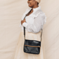 Deux Mains black woven foldover clutch crossbody bag with adjustable strap