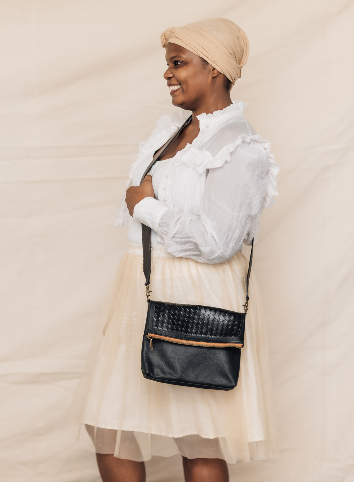 Deux Mains black woven foldover clutch crossbody bag with adjustable strap
