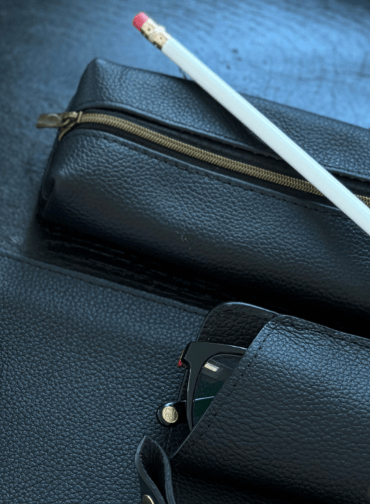 Black leather Deux Mains pencil case for organizing pens and pencils
