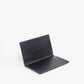 Deux Mains woven card holder wallet in black, interior view with card slots
