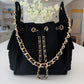 BEACH HAUS Bayshore Bucket Small in black, compact bucket-style bag with structured shape