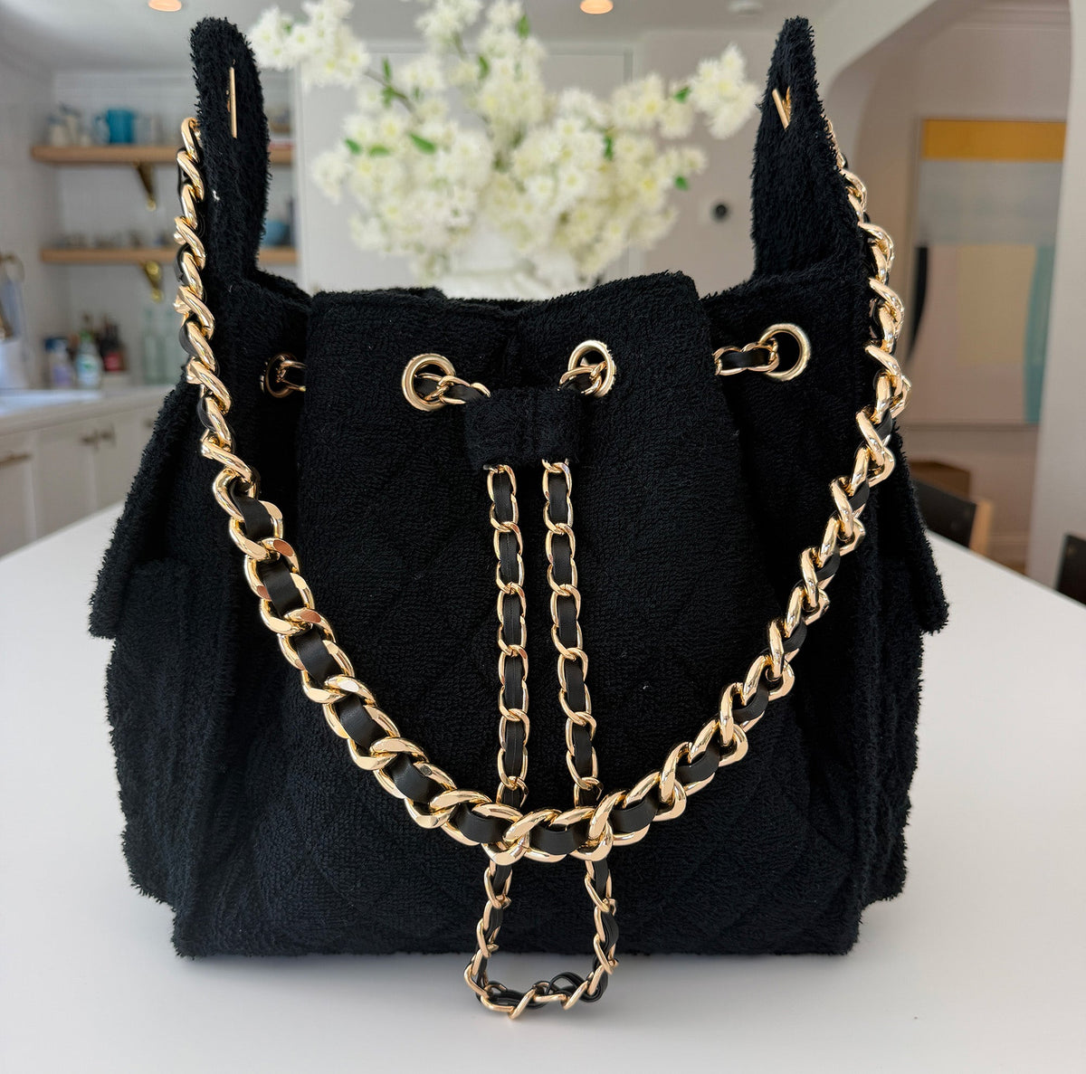 BEACH HAUS Bayshore Bucket Small in black, compact bucket-style bag with structured shape