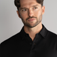 Black Twillory AthlPoloLS long sleeve polo shirt with solid design, featuring a classic collar and sleek fit.