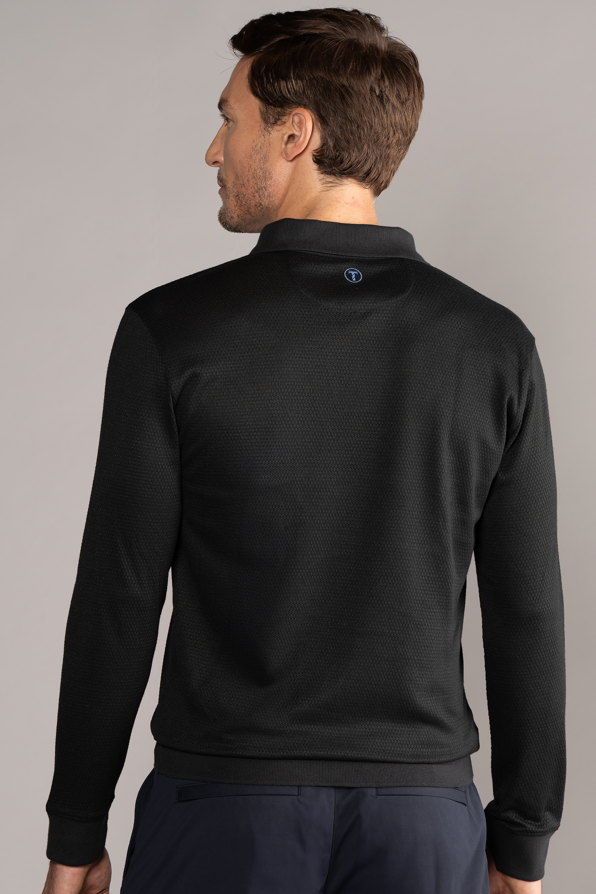 Black long sleeve sweater polo by Twillory, featuring a classic fit and solid design, perfect for casual or semi-formal wear.