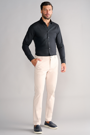 Black Twillory Leader Non-Iron Solid shirt displayed on a hanger, showing smooth fabric and classic collar detail.