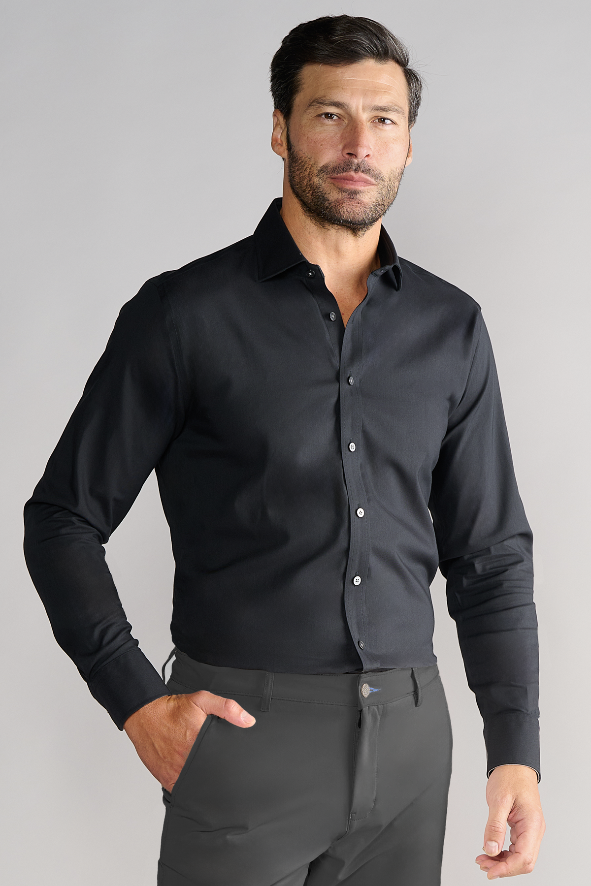 Black Twillory Leader Non-Iron Solid shirt displayed flat with collar and buttons, showcasing its smooth fabric and tailored fit.