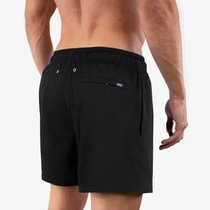 Black Onyx Hybrid Short by Capelle Miami featuring black solid design, compression lining, suitable for swim and resort wear.