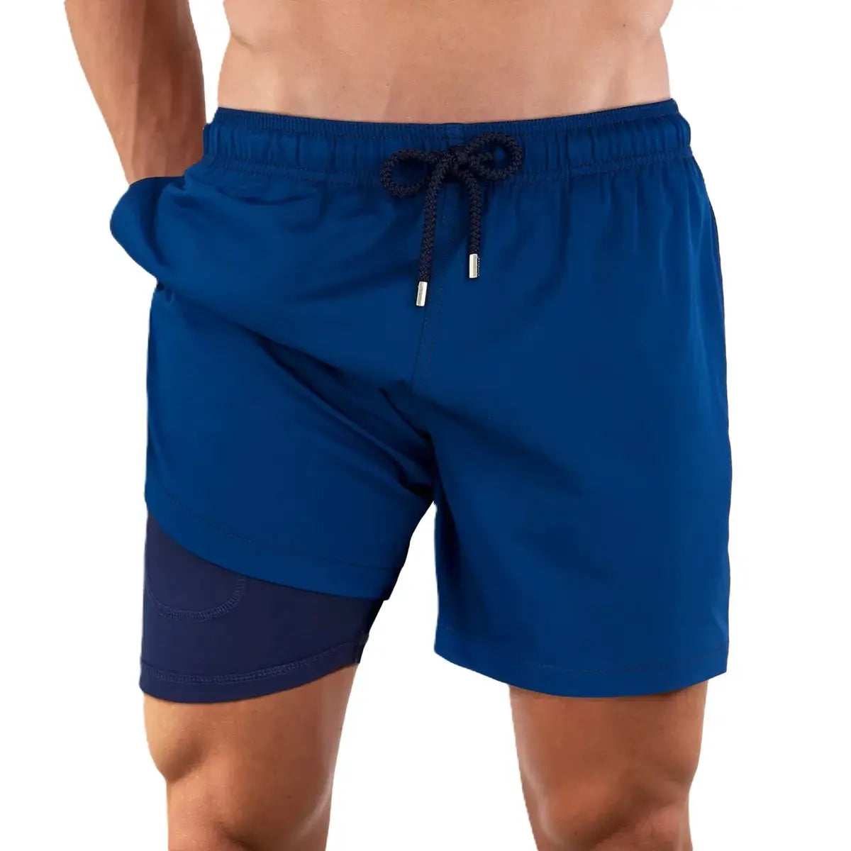 Blue Sapphire hybrid swim trunks by Capelle Miami featuring a solid blue color, compression lining, ideal for swimming and resort wear.