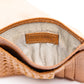Deux Mains Slim ID Case in cognac leather, interior view with card slots and ID window