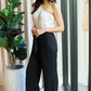 Dress Day Marvelous in Manhattan One-Shoulder Jumpsuit in White/Black - Farnelli