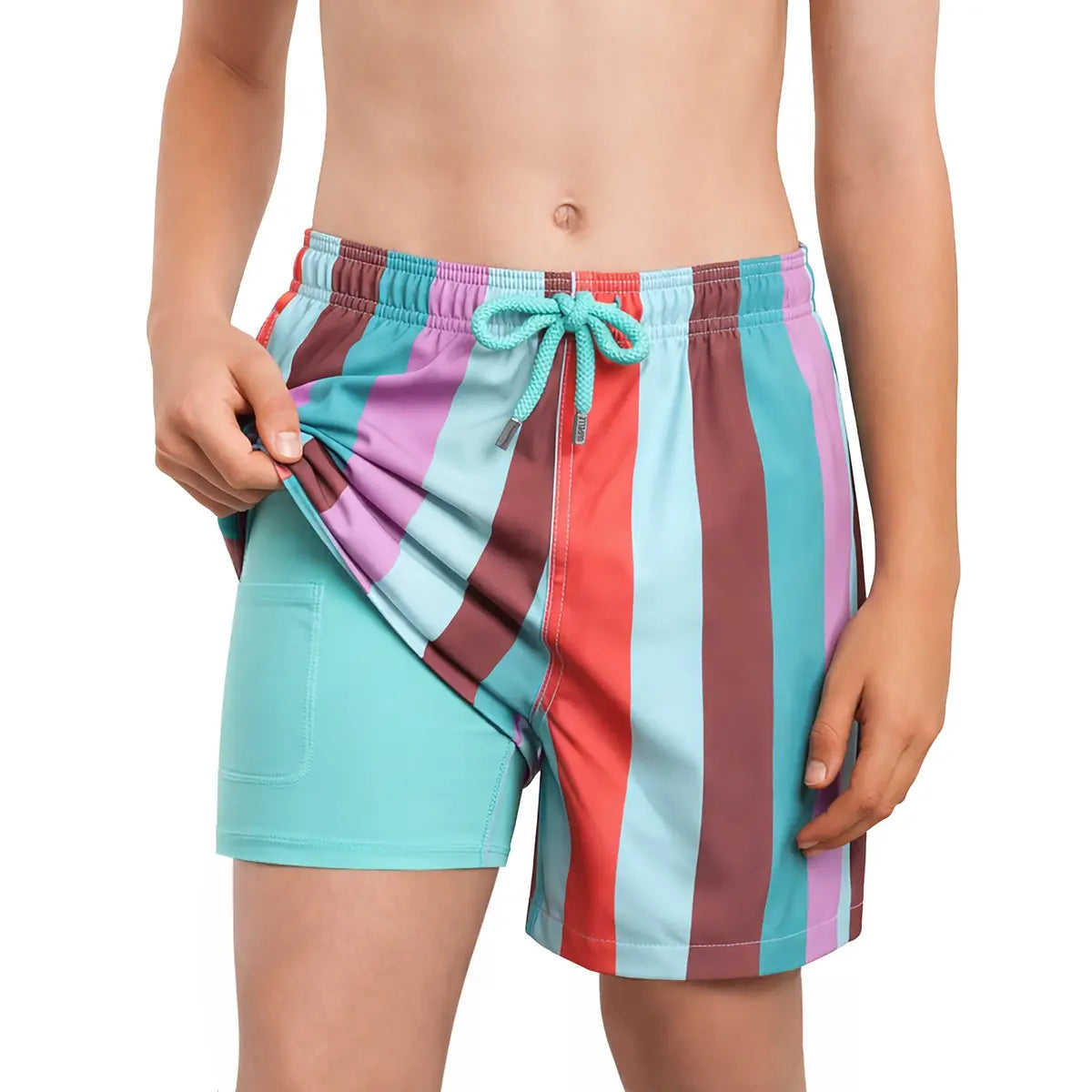 Boy wearing Capelle Miami Coastal Cabana Zest Boys Hybrid Swim and Play Trunk, featuring vibrant blue and coral colors.
