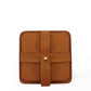 Deux Mains square cognac leather coasters, set of 4 with holder, front view