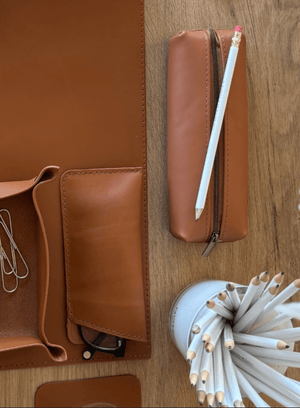 Cognac leather pencil case by Deux Mains with a simple rectangular design