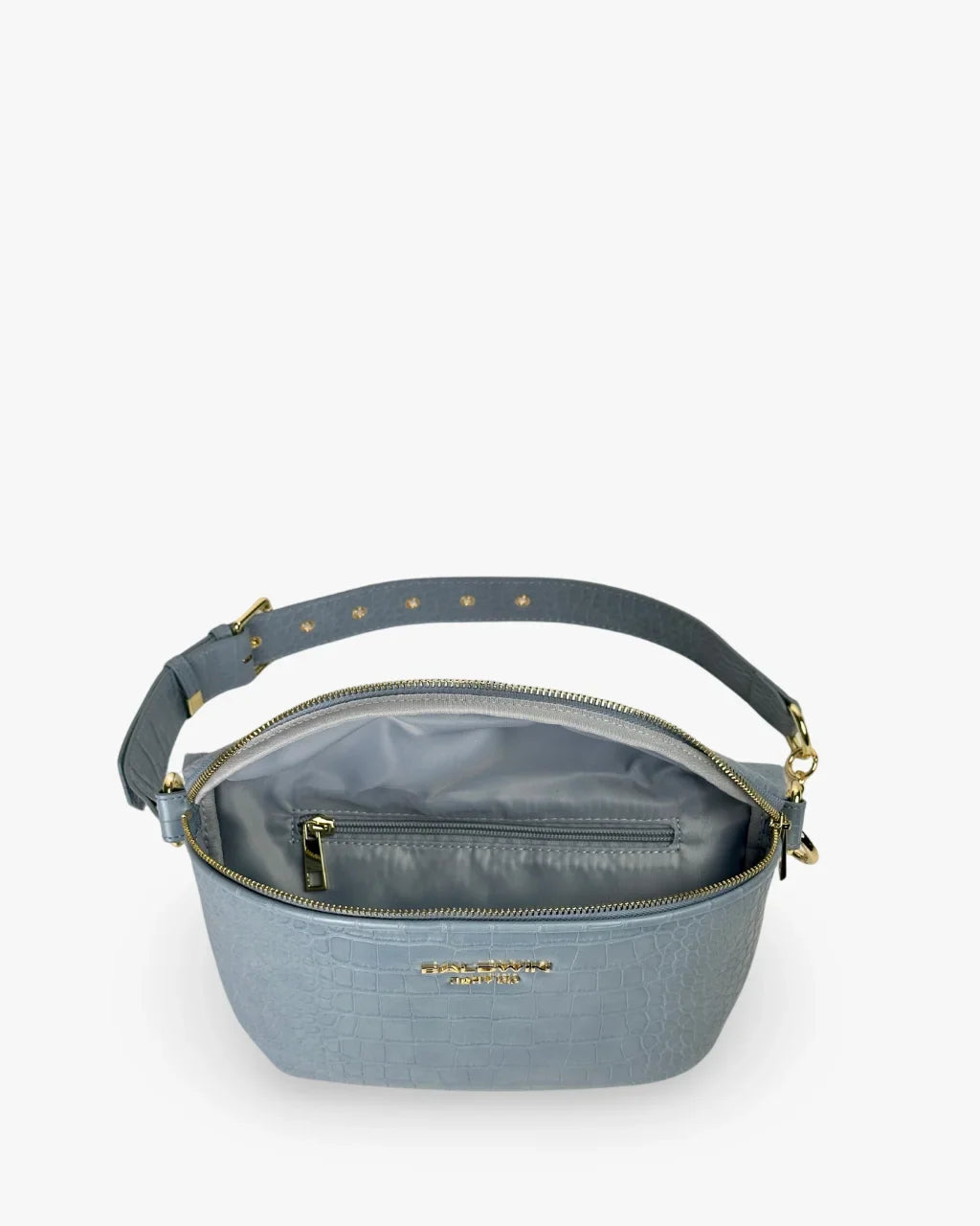 Baldwin Baby Company Ono Crossbody Belt Bag in Zephyr blue, interior view with diaper bag compartments