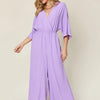 Double Take Full Size Surplice Wide Leg Jumpsuit with Pockets - Lavender