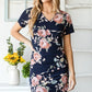 Heimish Full Size Ruched Floral Mini Dress Plus Size - Farnelli