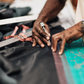 Deux Mains East-West handbag in leather, behind-the-scenes view