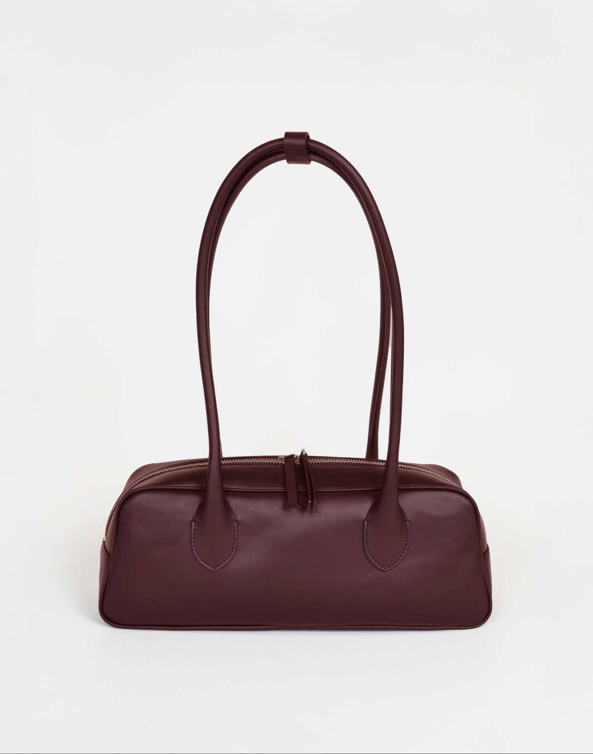 HYER GOODS La Strada East West Shoulder Bag in burgundy leather, featuring a sleek design with a top handle and adjustable strap.
