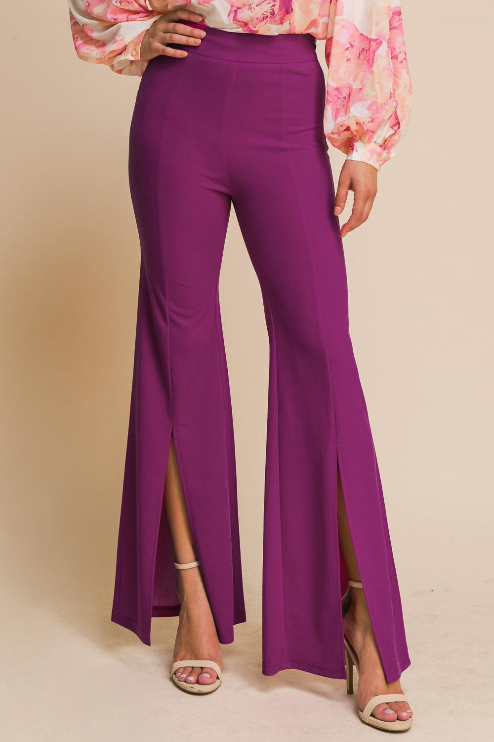 Flying Tomato Hey Darling woven flare pants with a high waist and vibrant pattern, displayed on a mannequin.