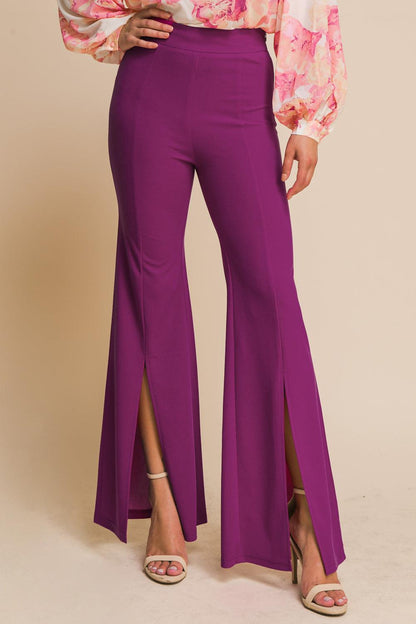 Flying Tomato Hey Darling woven flare pants with a high waist and vibrant pattern, displayed on a mannequin.