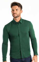 Twillory long sleeve button-down polo shirt in solid forest green, made from breathable fabric, with a classic collar and button cuffs.