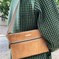 Carry Courage GUARDIAN belt bag in natural color, compact hands-free design with adjustable strap