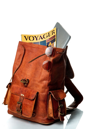 Tanned leather backpack from Classy Leather Bags featuring adjustable straps and multiple compartments for everyday use.
