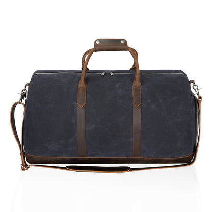 Double Oak Essentials weekender travel bag with leather handles and spacious interior, ideal for short trips and weekend getaways.