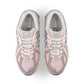 Silver and pink New Balance 1906 women's sneakers with stylish design and comfortable fit, shown on a white background.