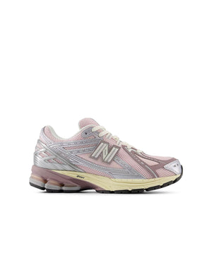 New Balance Women's 1906 Sneakers in silver and pink, stylish athletic footwear with supportive design and trendy color accents.
