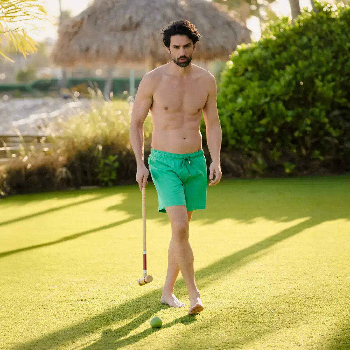 Capelle Miami Island Green hybrid swim trunks with compression-lined solid design, suitable for swimming and resort wear.