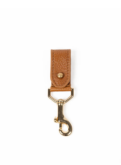 Deux Mains cognac leather key chain, front view