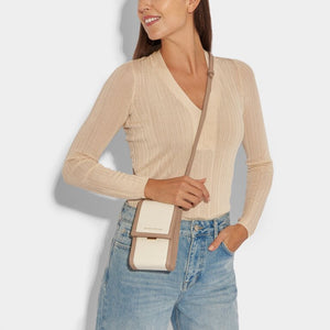 KADOU BOUTIQUE Amalfi Canvas Crossbody Cell Bag with adjustable strap and compact design, featuring beige and brown tones.