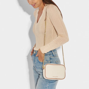 KADOU BOUTIQUE Amalfi canvas crossbody bag with adjustable strap and stylish design, perfect for casual outings.