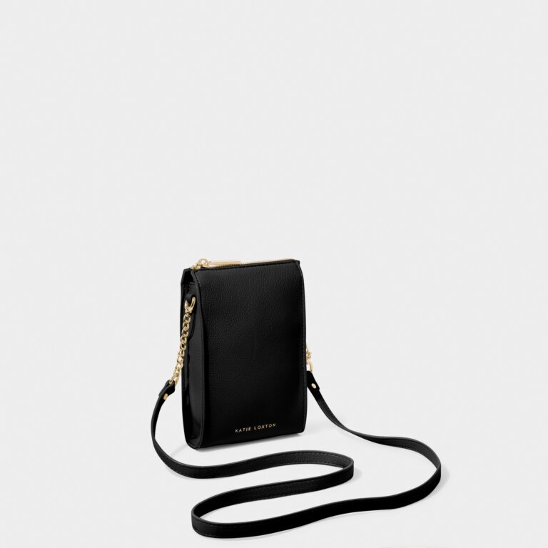 KADOU BOUTIQUE Zana Slim Crossbody bag in black leather with adjustable strap and minimalist design.