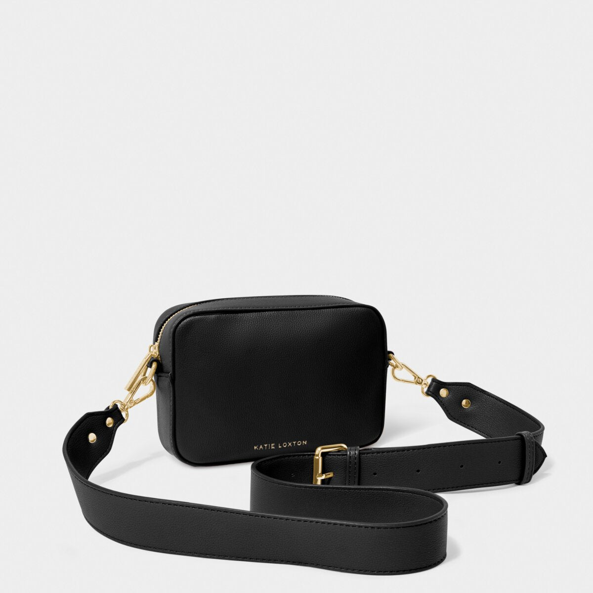 Black Zana Mini Crossbody Bag by KADOU BOUTIQUE with adjustable strap and compact design, perfect for everyday use.