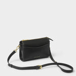 KADOU BOUTIQUE Perri Crossbody bag in black leather with adjustable strap and silver hardware, stylish and compact for everyday use.