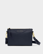 KADOU BOUTIQUE Alba Crossbody Bag in black with adjustable strap and sleek design, shown on a white background.