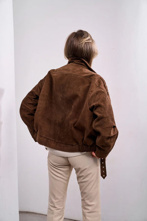 Alaska® Genuine Lamb Leather Suede Oxford Coat with hood, stylish and warm, in a tan color, displayed on a hanger.