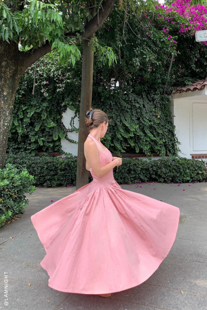 Pink woven midi dress from Flying Tomato's Caught in the Rain collection, featuring a flowy, stylish design perfect for spring.