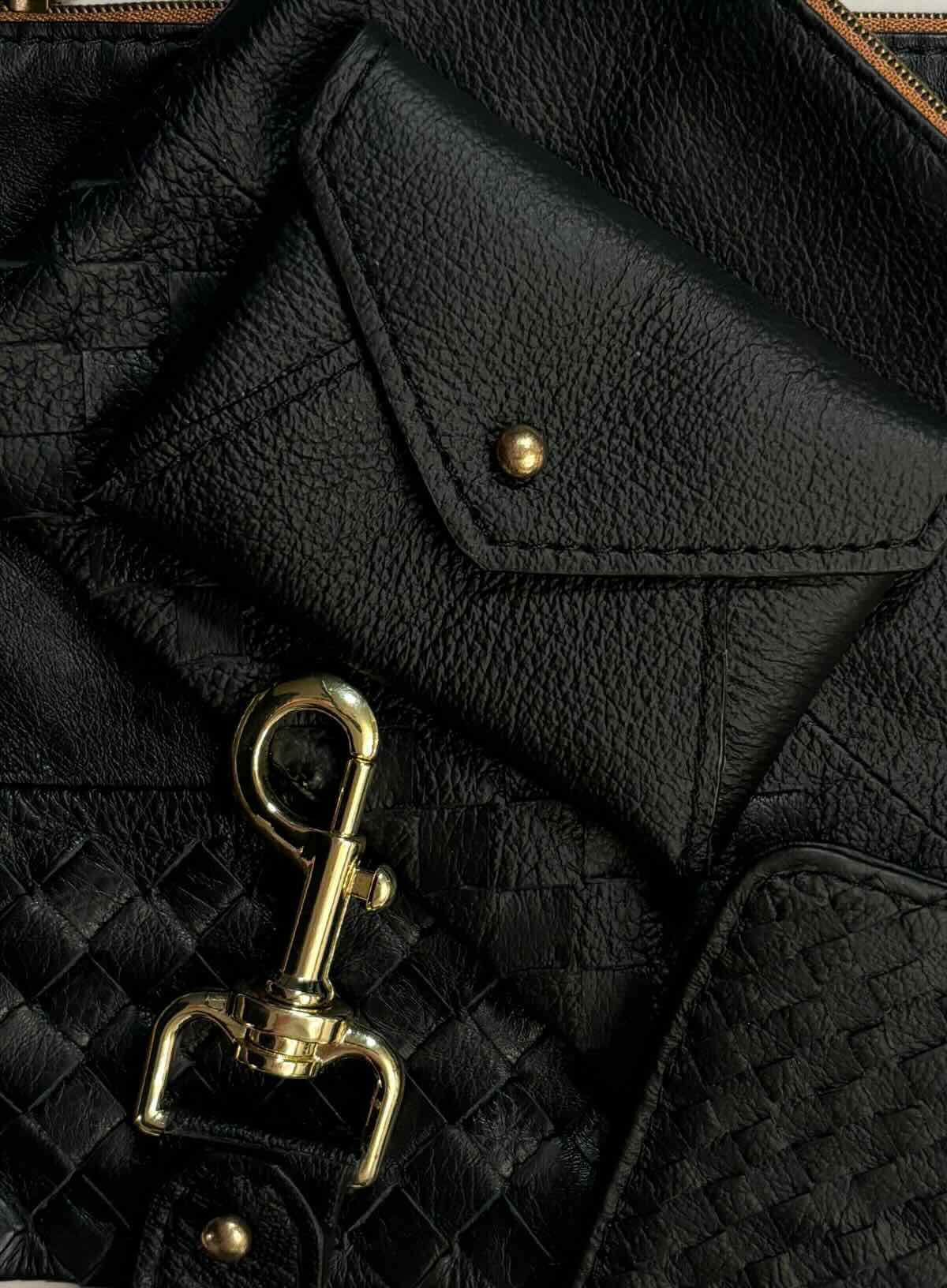 Deux Mains black leather coin pouch in a matching accessories set