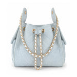 BEACH HAUS Bayshore Bucket Small in light wash denim, structured bucket bag with rounded silhouette