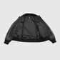 Inside view of Whet Blu NYC men's varsity bomber jacket showing striped ribbed collar and quilted lining
