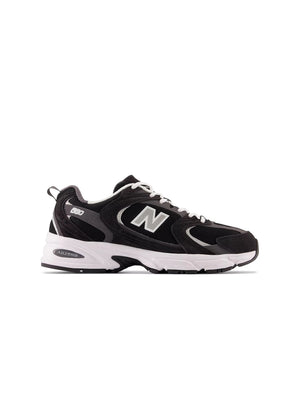 Black and white New Balance Men's 530 running shoes with breathable mesh and supportive sole, designed for athletic comfort.