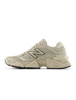 New Balance Mens 9060 Shipyard lifestyle shoes showcasing navy and grey color-blocked design and sporty sneaker details.