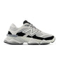 White and black New Balance 9060 men's lifestyle shoes with stylish design and sporty look.