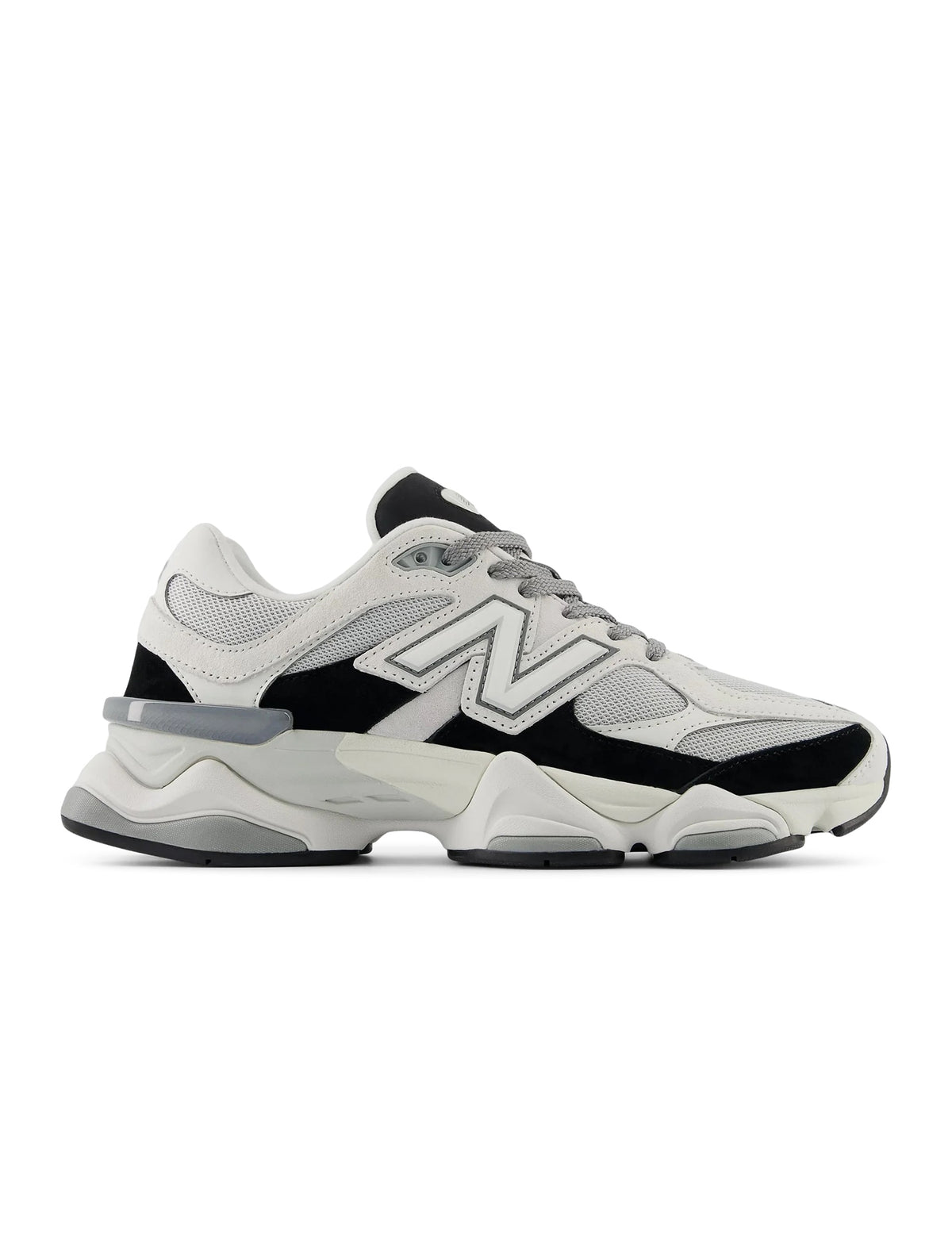 White and black New Balance 9060 men's lifestyle shoes with stylish design and sporty look.