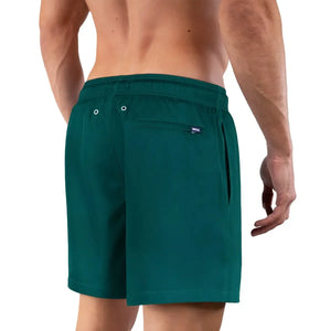 Night green hybrid swim trunk with compression lining from Capelle Miami, shown from the back with a smooth, solid design.