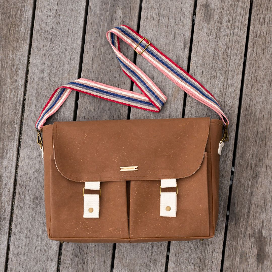 Carry Courage NOMAD SEPIA strap collection in rainbow colors, showing adjustable woven straps